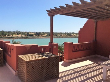 Roof Terrace view to lagoon and Golf course
