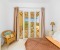 3. Schlafzimmer mit Terrasse und Blick zum Pool.