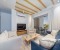 Elegantes Wohnzimmer mit gemütlichen Sitzmöbeln und Smart TV