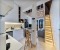 Modernes Apartment mit offener Küche,Wohnbereich und Empore mit extra Bett