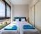Schlafzimmer 3 mit gro&szlig;em Schrank und Ausblick 